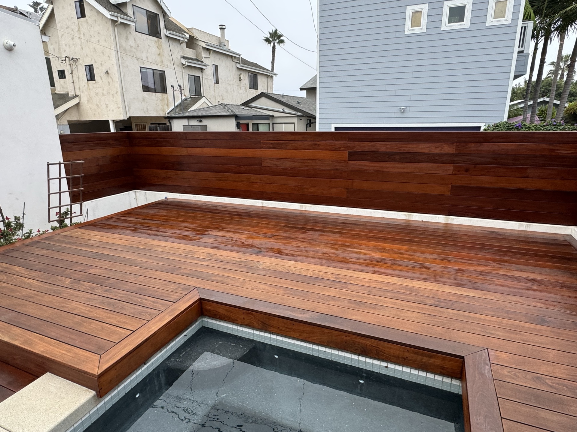 Ipe hardwood deck surrounding pool and spa