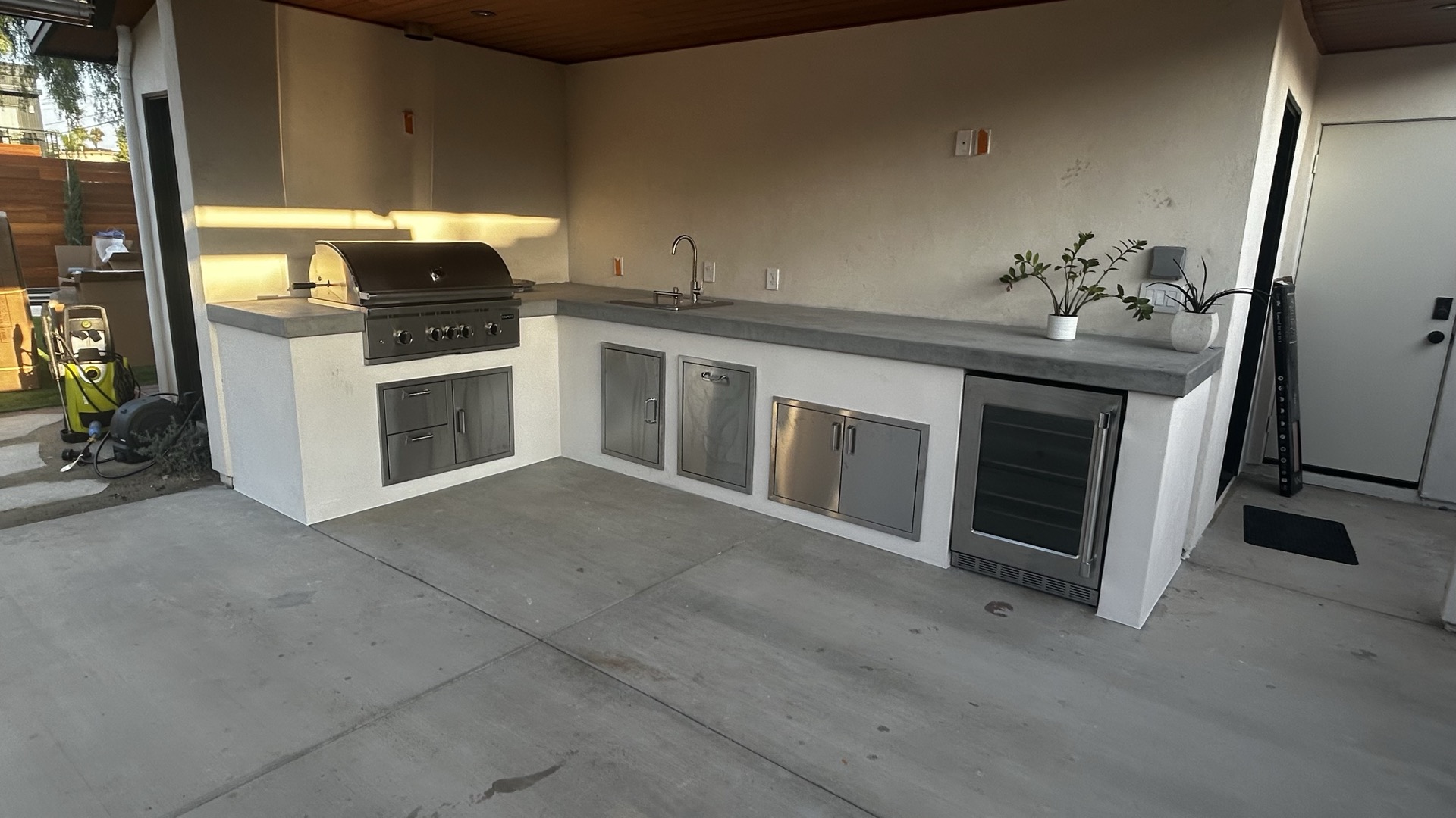 Stainless steel outdoor kitchen setup in San Diego backyard