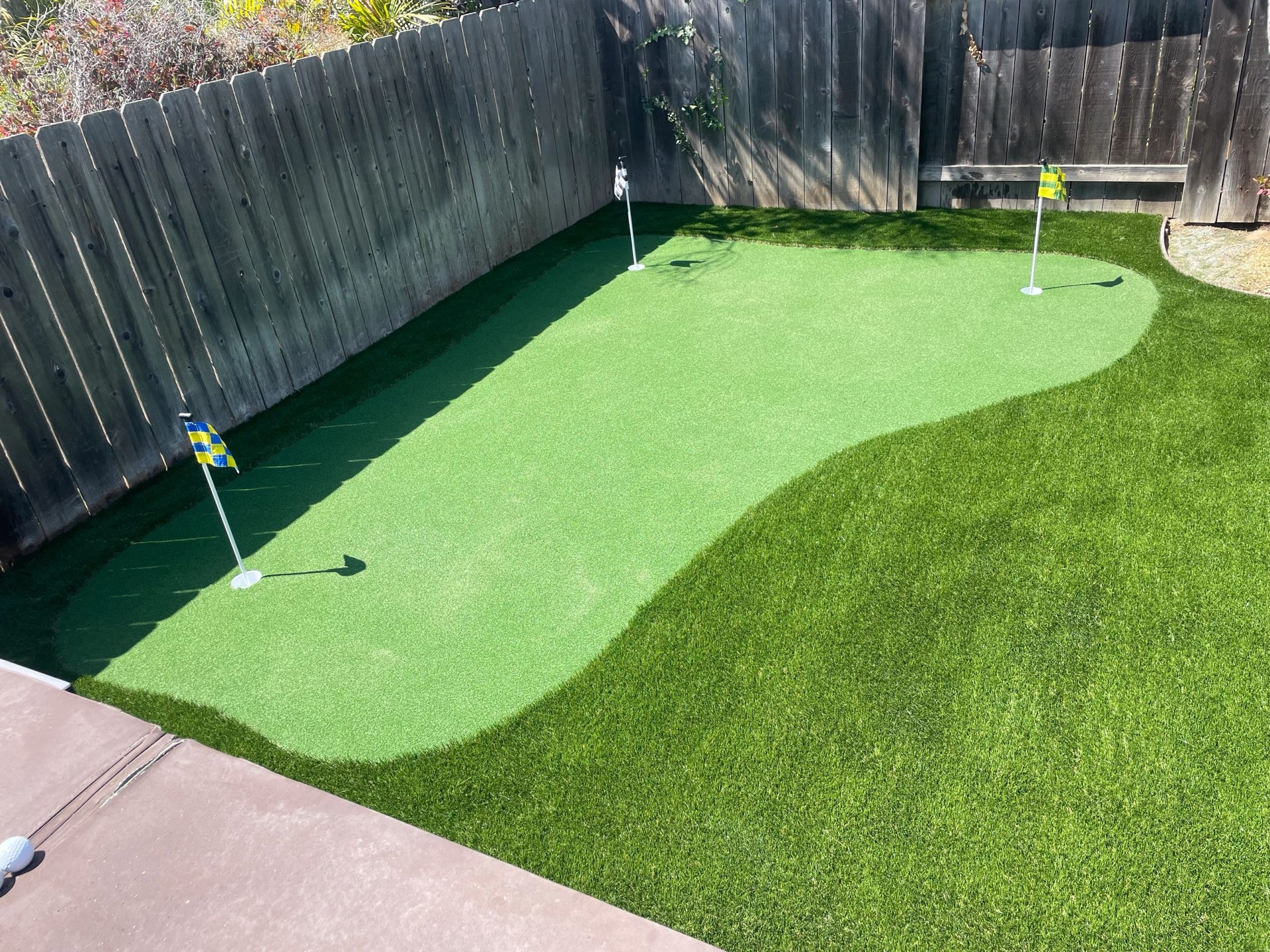 Custom three-hole backyard putting green
